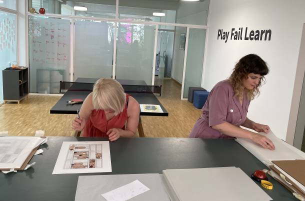 BiglerWeibel signing their prints