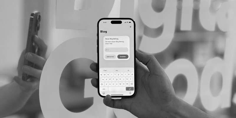Ein iOS26-Screen vor einer spiegelnden Wand im Büro von Apps with love